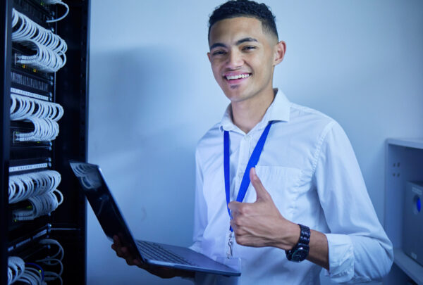 Man, thumbs up and server room on computer in cybersecurity, IT cables and hardware or data safety .